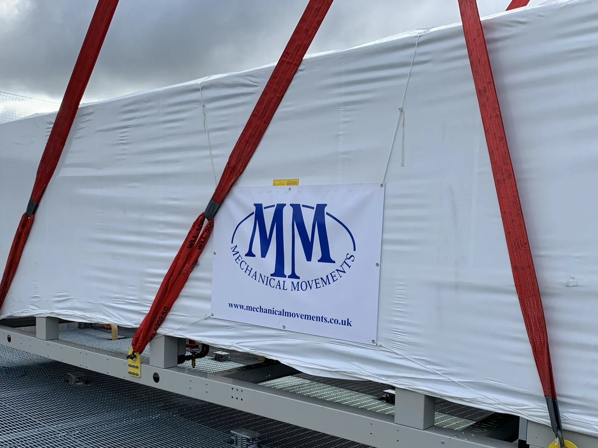 Mechanical Movements logo on wrapped equipment