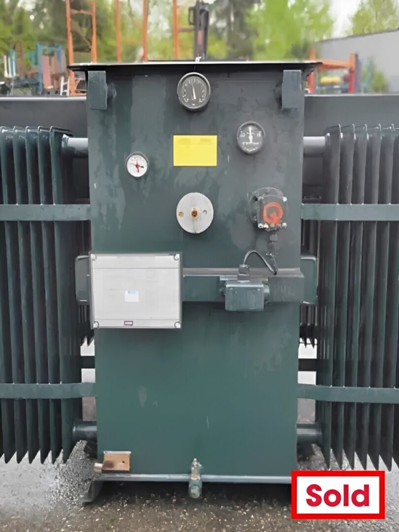 Large green electrical transformer sold